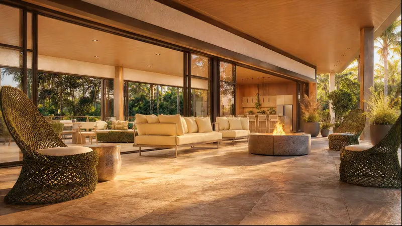 Lounge integrado à cozinha gourmet, com sofás claros, poltronas de trama escura e mesa de fogo, forro de madeira e grandes panos de vidro abertos para o jardim tropical.